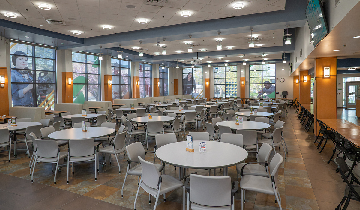 empty dining area with round tables and chairs
